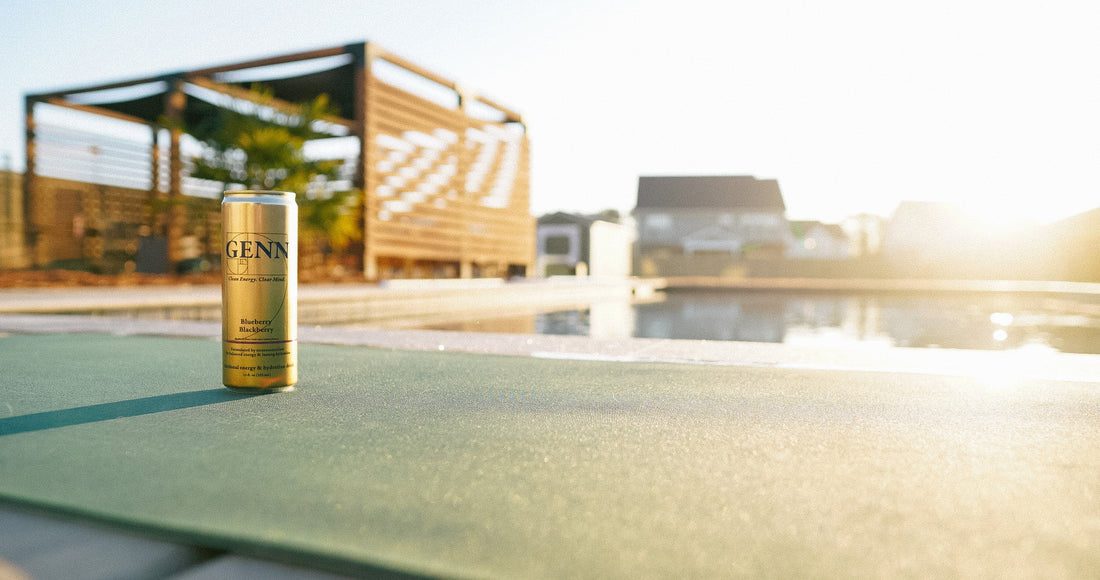 GENN Energy can & yoga by pool during golden hour